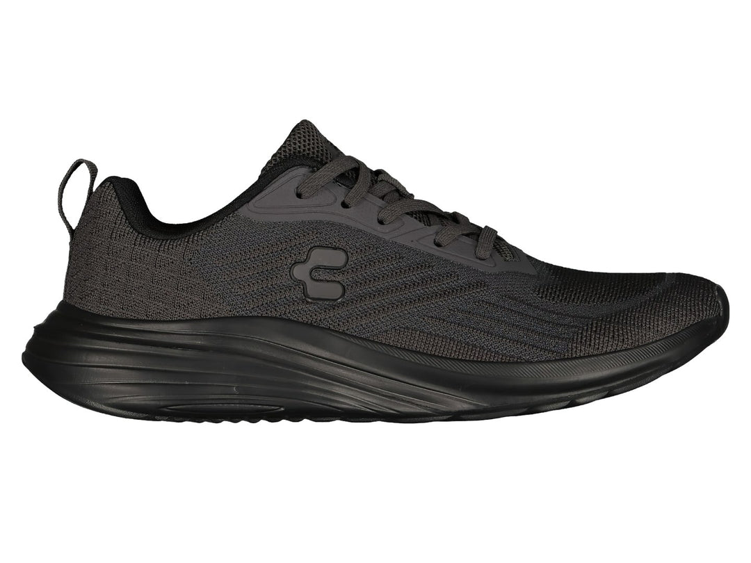 Par de tenis deportivos Charly en color gris oscuro con suela negra y agujetas coordinadas.