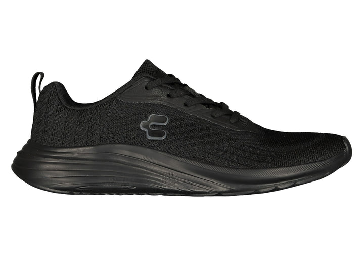 Par de tenis deportivos Charly en color negro con tejido de malla y suela negra.