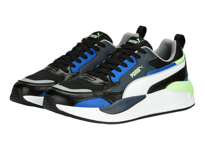 Tenis PUMA X-RAY 2 SQUARE en colores negro, blanco, azul y verde lima con suela blanca.