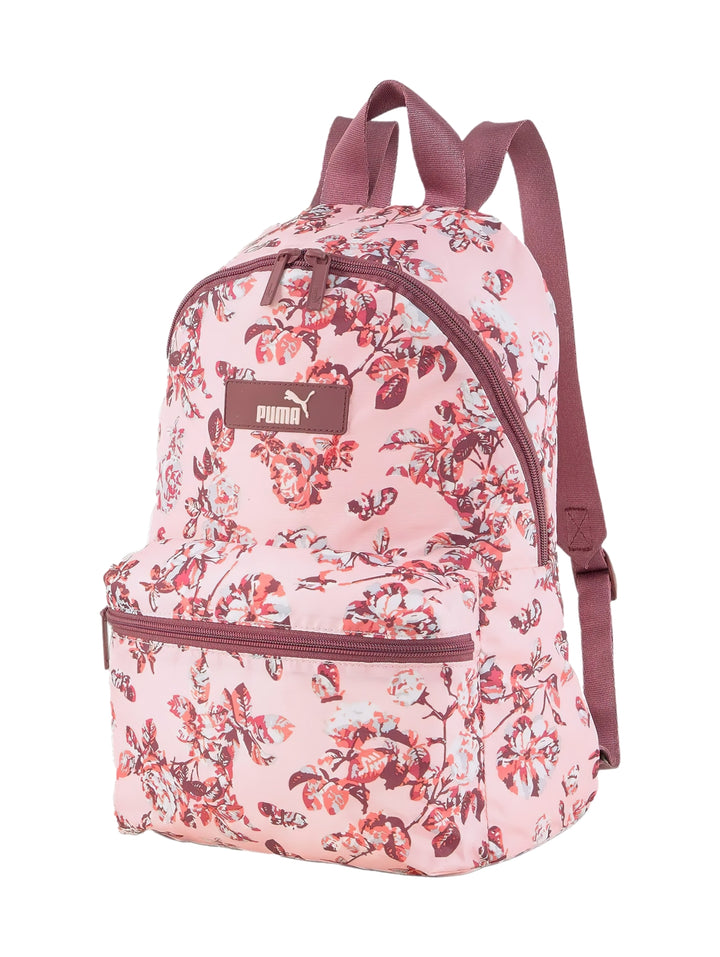 Mochila PUMA color rosa con estampado floral en tonos guinda y rosa, con bolsillo frontal y correas ajustables.