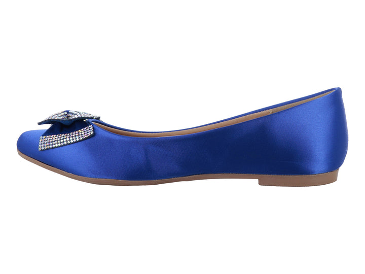 Zapato plano color azul cobalto con un moño decorado con pedrería brillante en la punta.