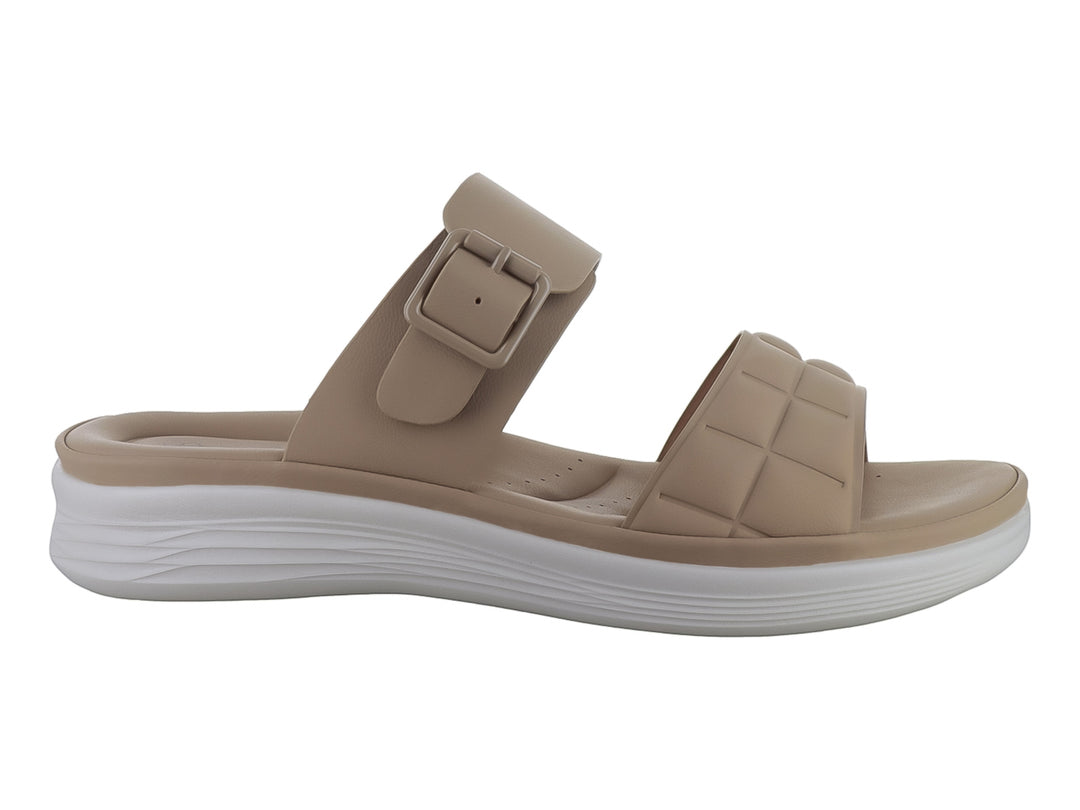 Sandalia beige de plataforma con correa ajustable y suela blanca para mujer.