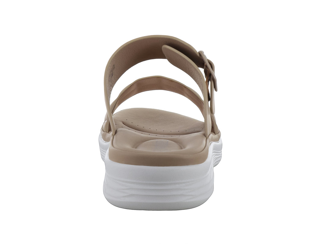 Sandalia beige de plataforma con correa ajustable y suela blanca para mujer.