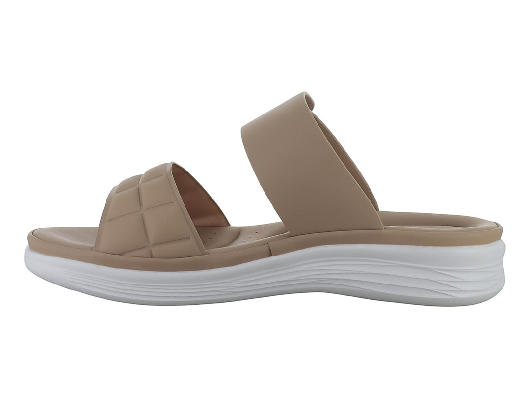 Sandalia beige de plataforma con correa ajustable y suela blanca para mujer.