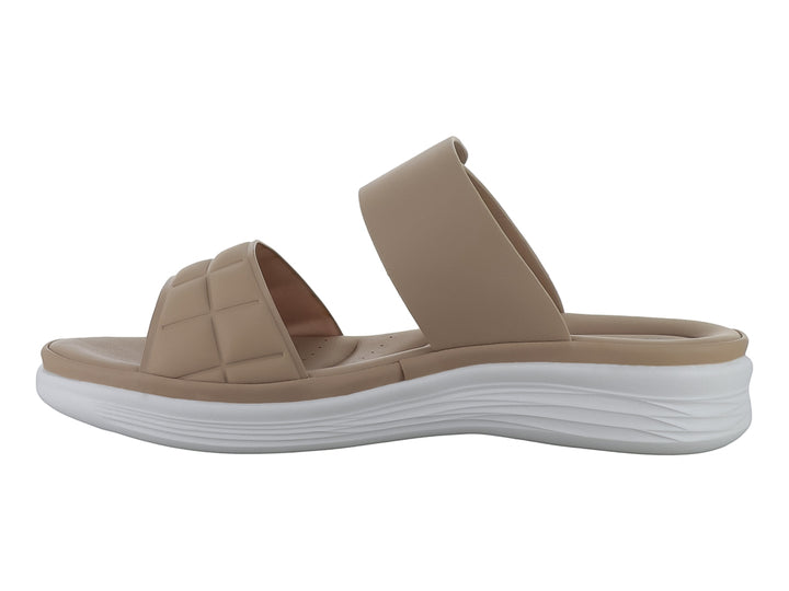 Sandalia beige de plataforma con correa ajustable y suela blanca para mujer.