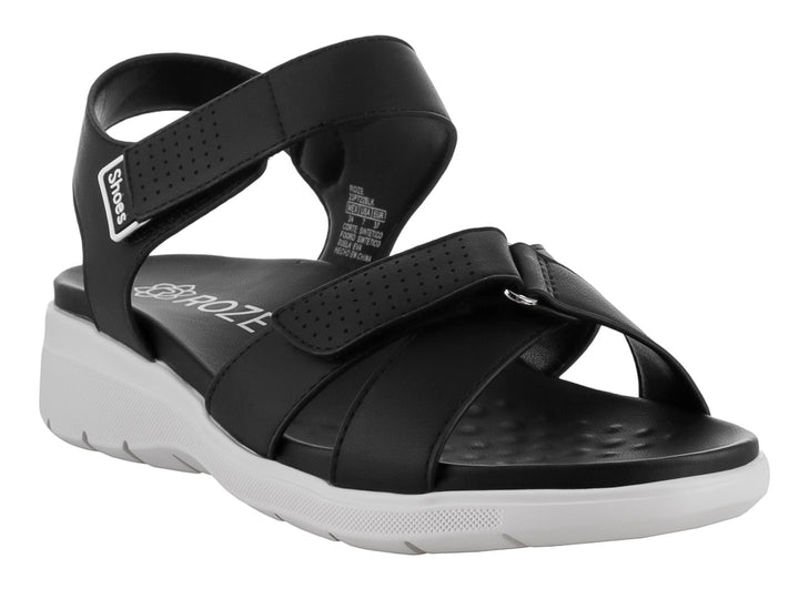 Sandalia ROZE color negro con suela blanca, correas ajustables de velcro y diseño casual.