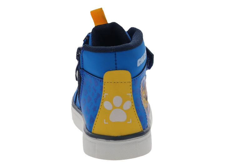 Tenis azul de bota para niño con personajes de Paw Patrol y suela blanca.