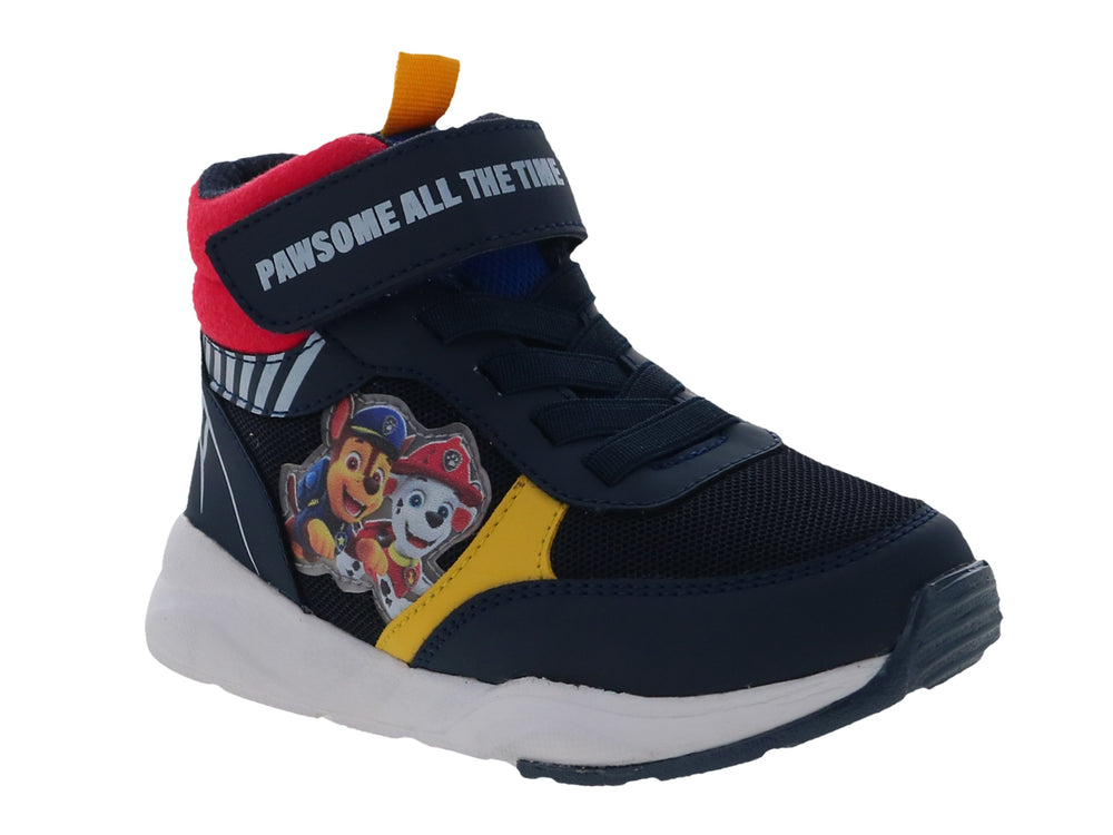Tenis infantiles azul marino con personajes de Paw Patrol, detalles rojos y amarillos y suela blanca.
