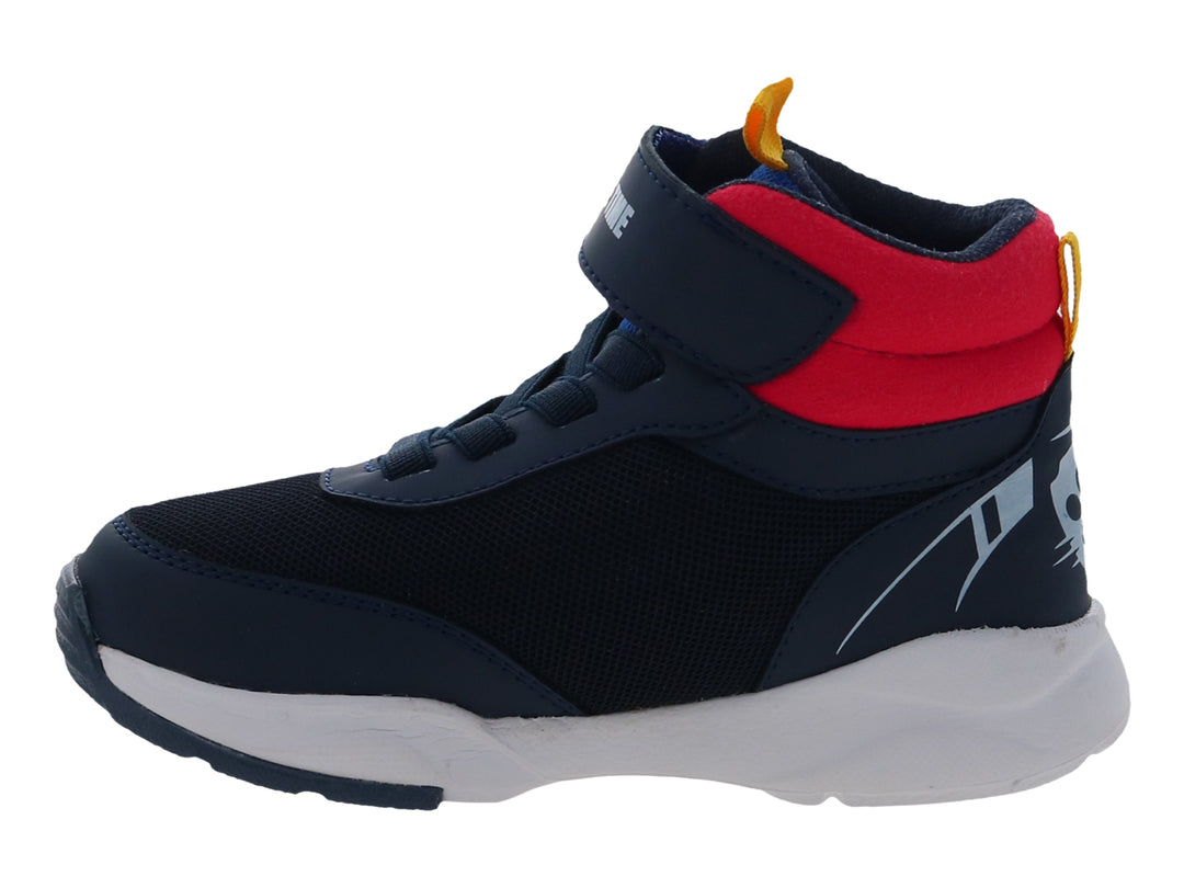 Tenis infantiles azul marino con personajes de Paw Patrol, detalles rojos y amarillos y suela blanca.