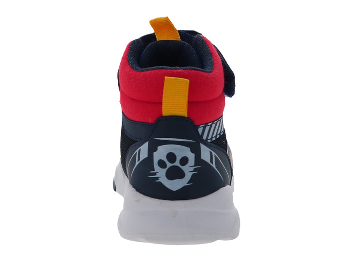 Tenis deportivos color marino para niño con diseño de Paw Patrol, detalles en rojo y amarillo, y suela blanca.