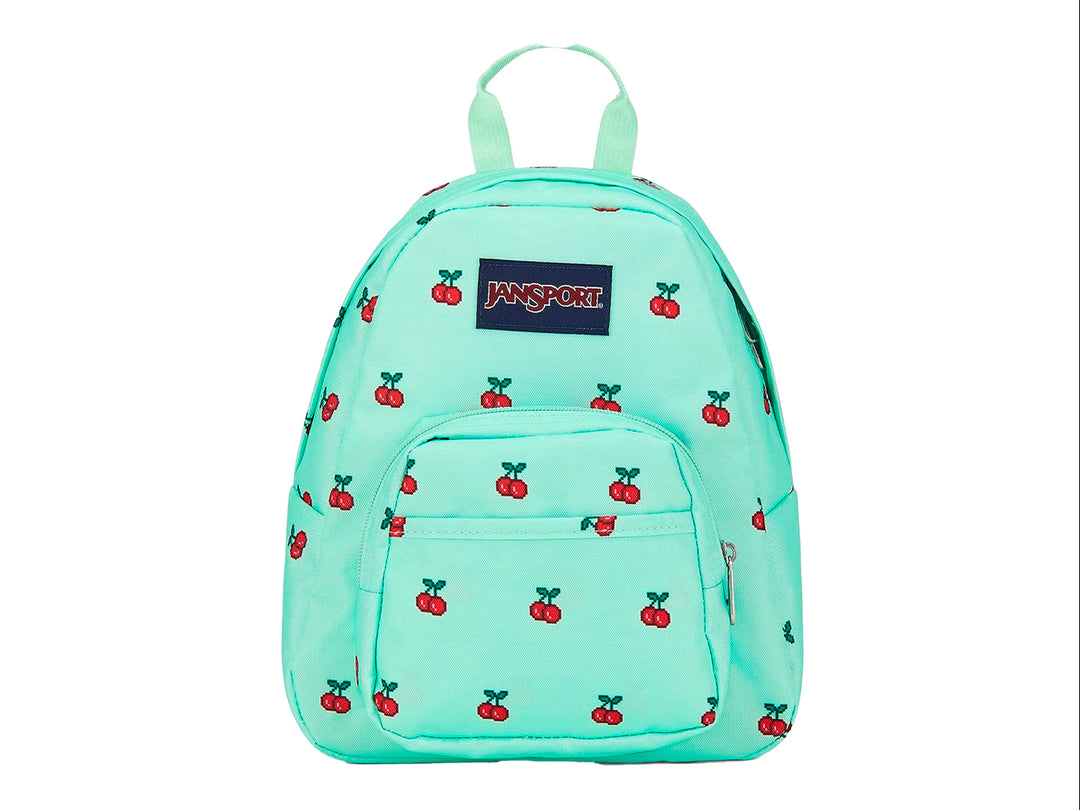 Mochila JanSport color verde menta con estampado de cerezas estilo 8 bit y bolsillo frontal.