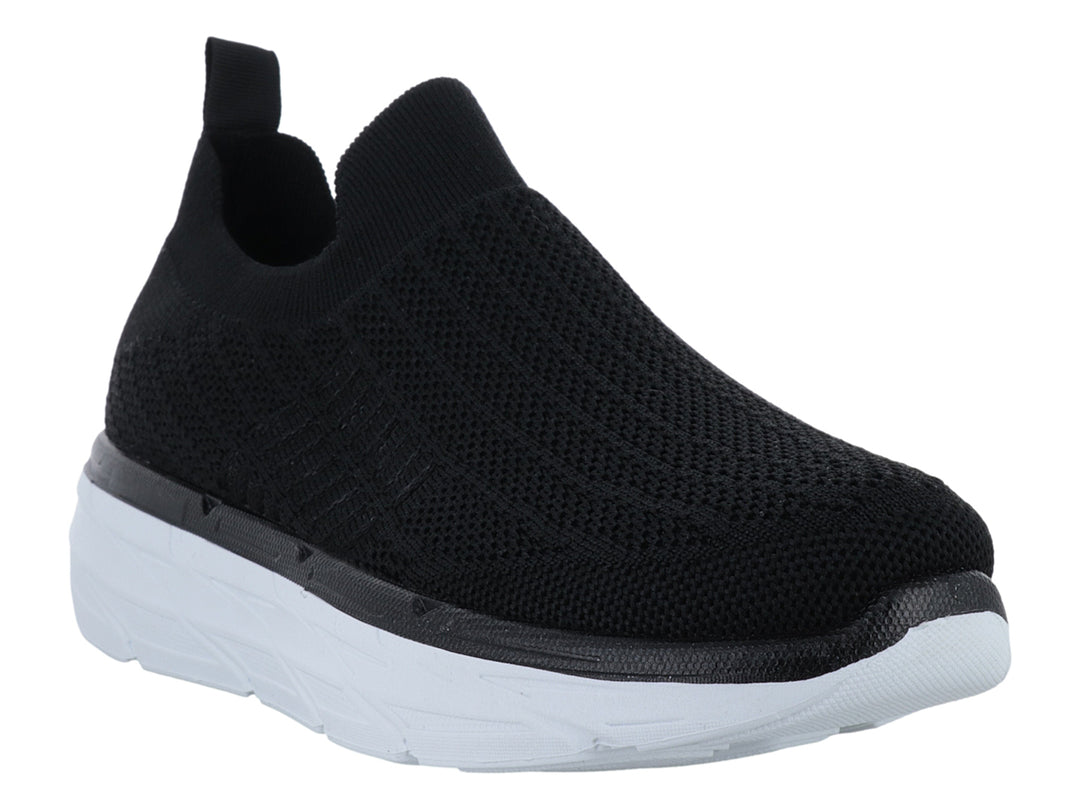 Tenis Furor negros de tela sin cordones con suela blanca gruesa y contours modernos.
