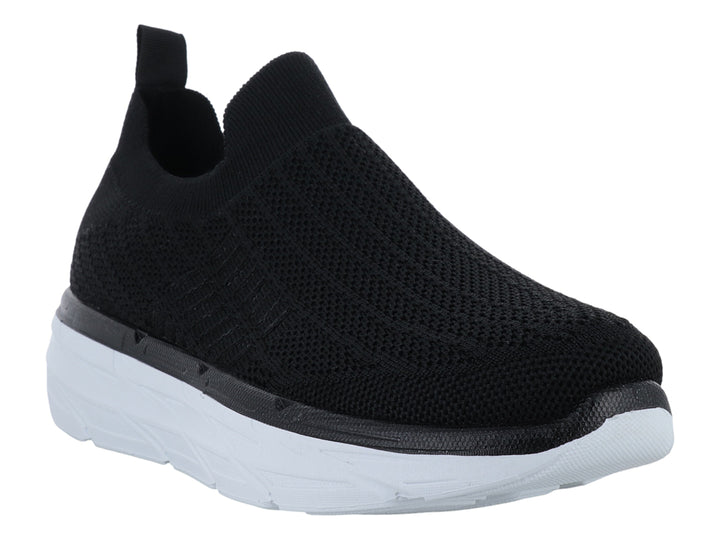Tenis Furor negros de tela sin cordones con suela blanca gruesa y contours modernos.