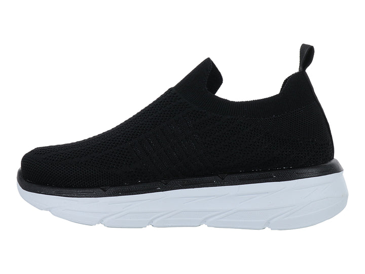 Tenis Furor negros de tela sin cordones con suela blanca gruesa y contours modernos.
