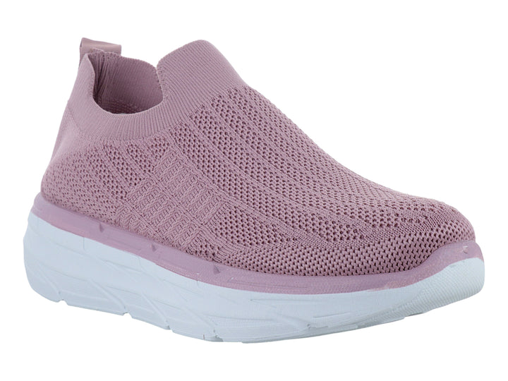 Tenis deportivos Furor color rosa con suela blanca, diseño slip-on de tela tejida.