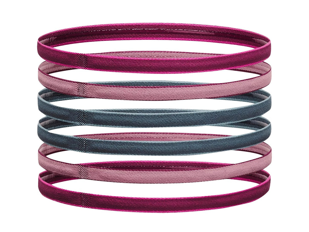 Set de 6 diademas deportivas Under Armour en colores morado, rosa y gris.