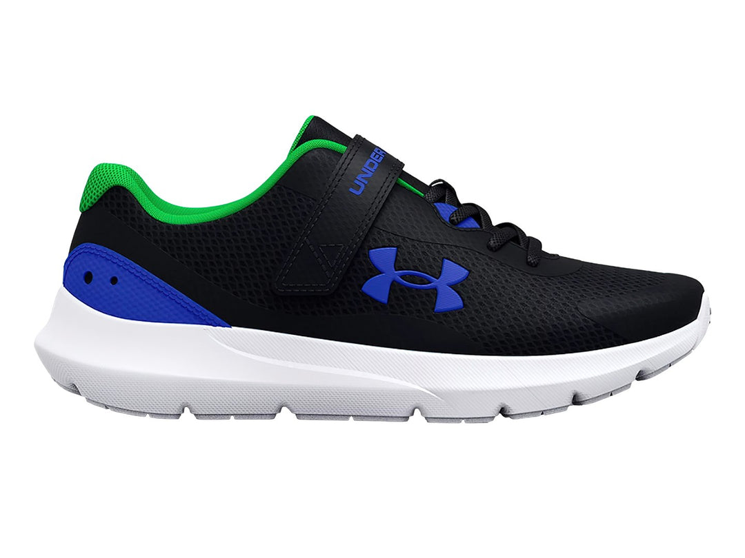 Tenis deportivos Under Armour color negro con detalles en azul y verde, suela blanca y cierre de velcro.