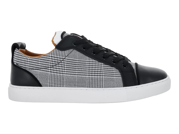 Tenis casuales Platini con diseño de cuadros en gris y negro, detalles sintéticos negros y suela blanca.
