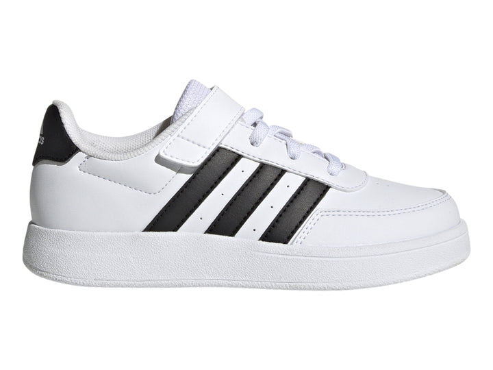 Tenis Adidas Breaknet 2.0 color blanco con tres franjas negras laterales, cierre de velcro y cordones para niño.