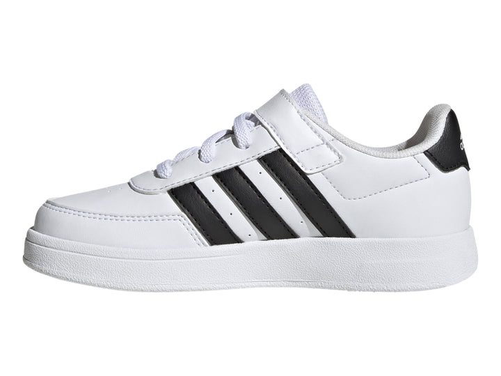 Tenis Adidas Breaknet 2.0 color blanco con tres franjas negras laterales, cierre de velcro y cordones para niño.