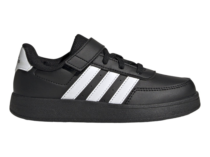 Tenis Adidas Breaknet 2.0 color negro con tres franjas blancas laterales y cierre de banda elástica para niños.