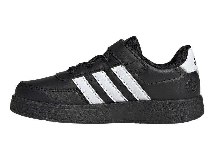 Tenis Adidas Breaknet 2.0 color negro con tres franjas blancas laterales y cierre de banda elástica para niños.