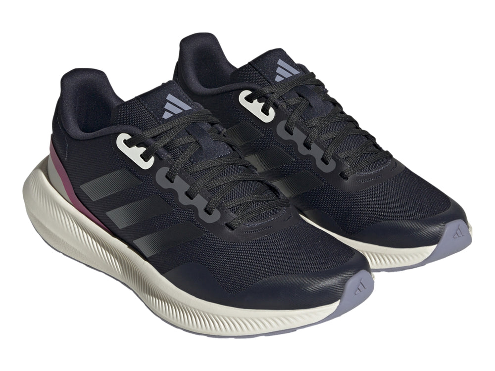 Tenis deportivos Adidas color azul marino con suela blanca y detalle fucsia en el talón.