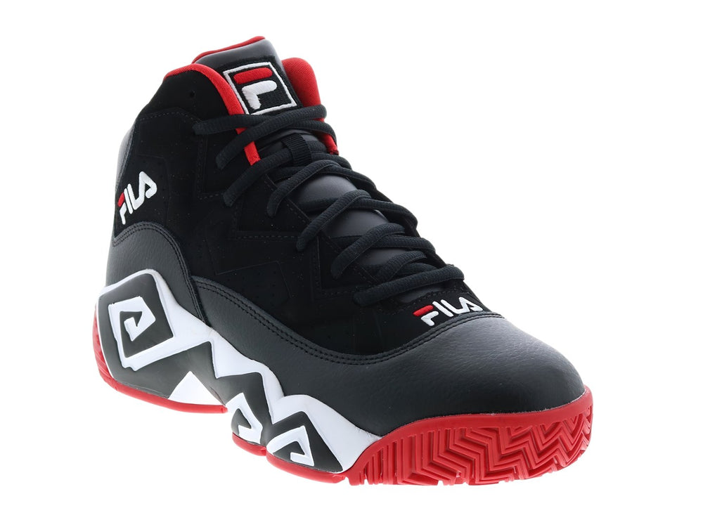 Tenis de baloncesto FILA MB color negro con patrones geométricos blancos y suela roja.