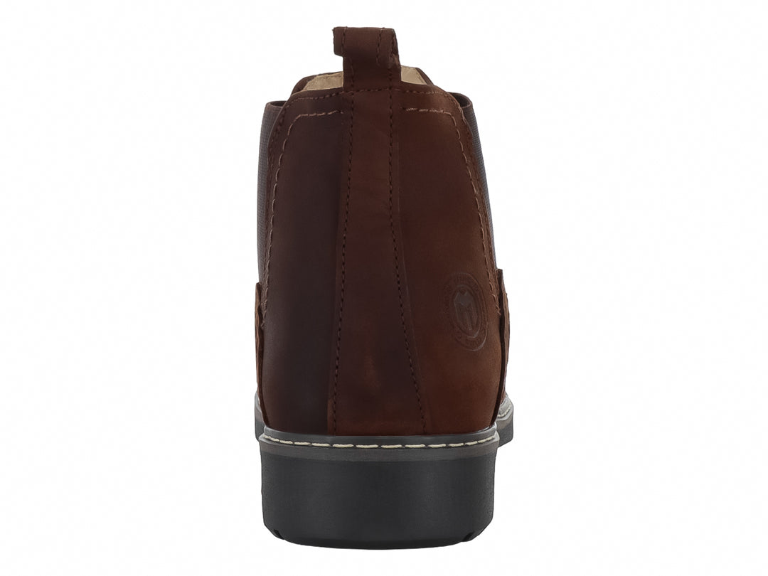 Bota Merano estilo Chelsea en color marrón chocolate con suela negra y detalle elástico lateral.