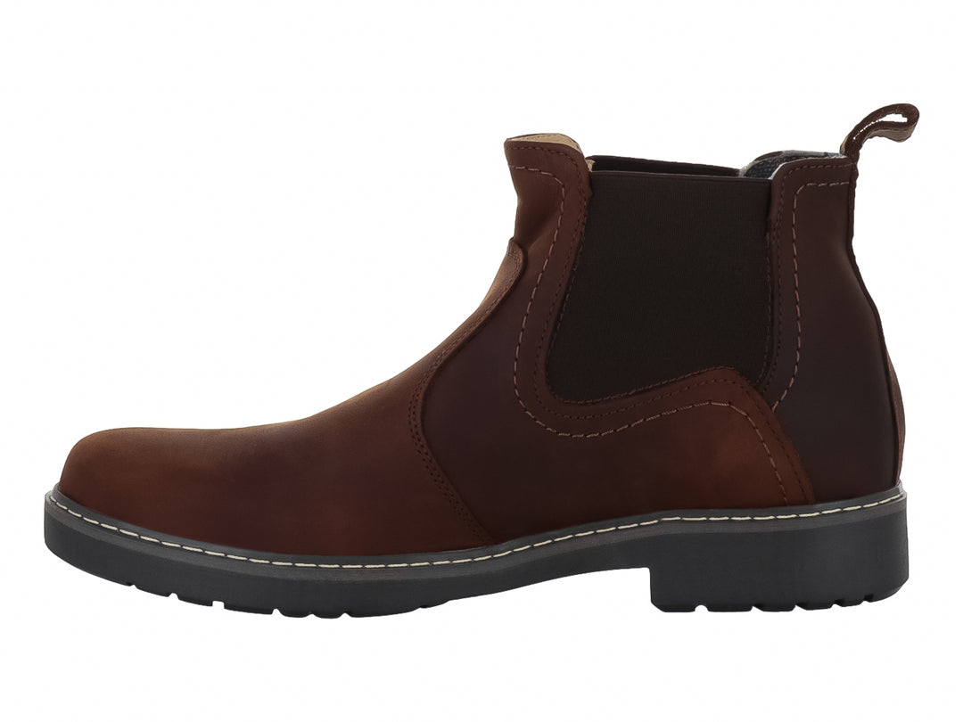 Bota Merano estilo Chelsea en color marrón chocolate con suela negra y detalle elástico lateral.