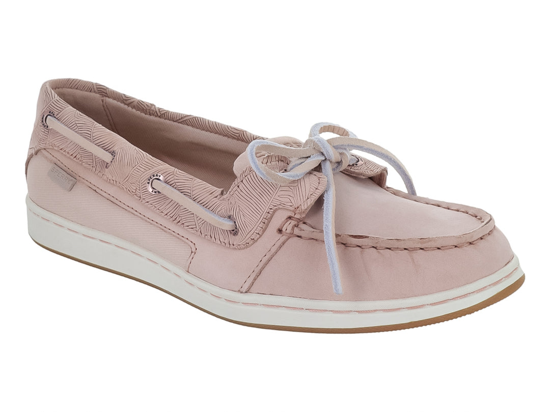 Zapato náutico Sperry color rosa con textura grabada y suela blanca.