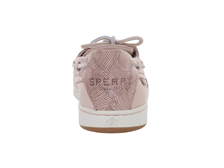 Zapato náutico Sperry color rosa con textura grabada y suela blanca.