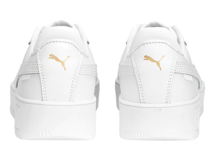 Tenis PUMA Carina Street color blanco con suela de plataforma.