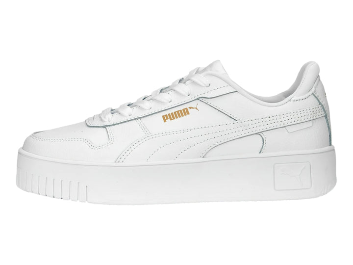 Tenis PUMA Carina Street color blanco con suela de plataforma.