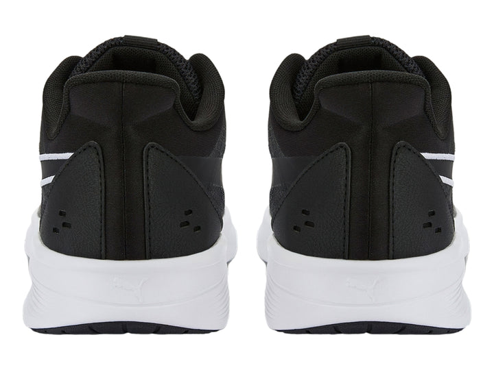 Tenis PUMA Transport Modern color negro con suela blanca y tejido de malla.