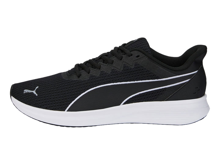 Tenis PUMA Transport Modern color negro con suela blanca y tejido de malla.