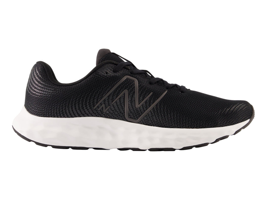 Tenis deportivos New Balance en color negro con suela blanca y tejido de malla.