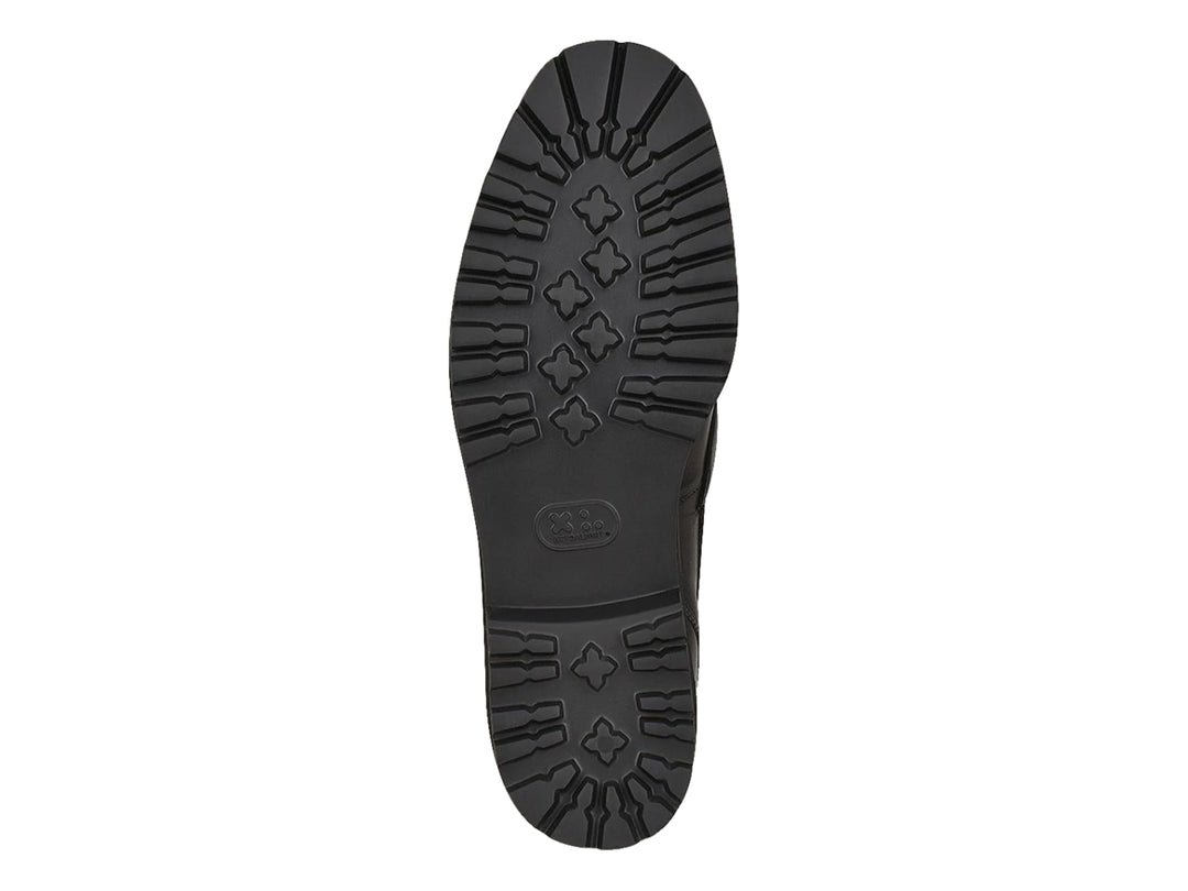 Zapato mocasín negro de cuero con detalle de mantarraya y suela gruesa