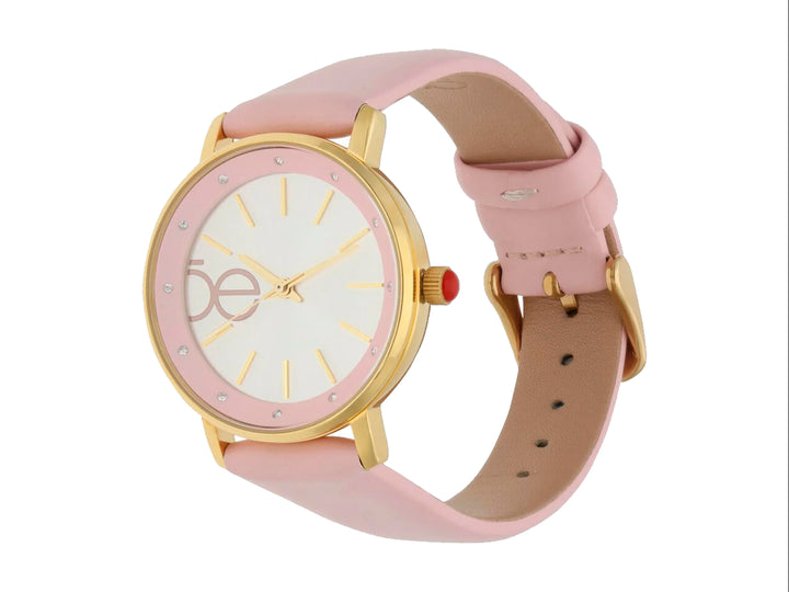 Reloj análogo Cloe para mujer con correa rosa y marco dorado.
