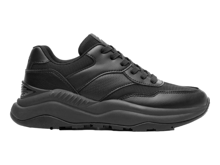 Tenis deportivos Flexi en color negro con suela robusta y detalles en textil y sintético.