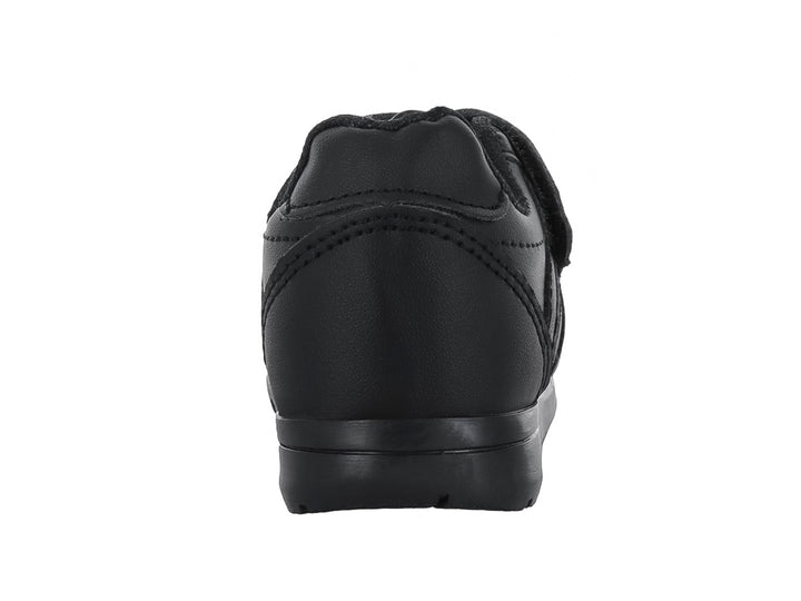 Zapato escolar negro para niño con cierres de velcro y suela dentada.