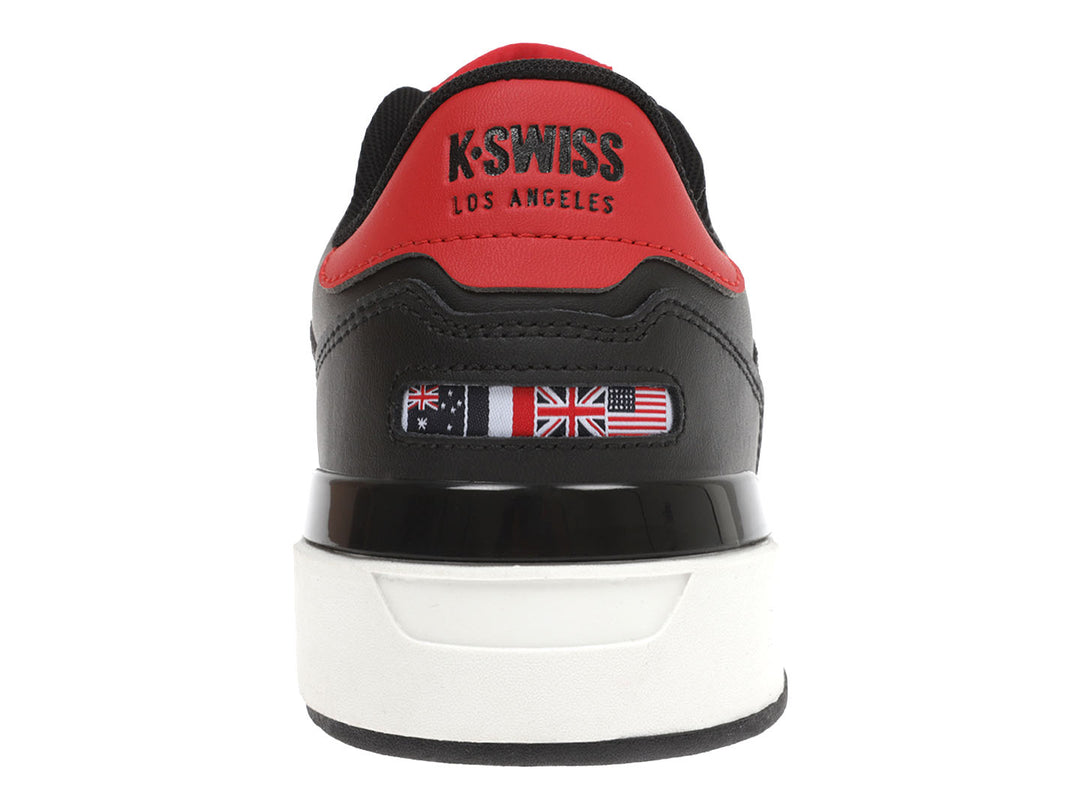 Tenis K-Swiss color negro con suela blanca y detalles rojos en la parte posterior.