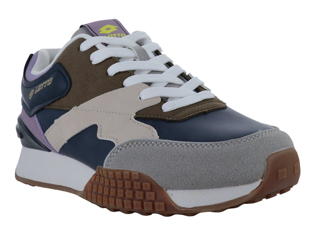 Tenis deportivos Lotto multicolor en azul marino, beige y morado con suela blanca y marrón.