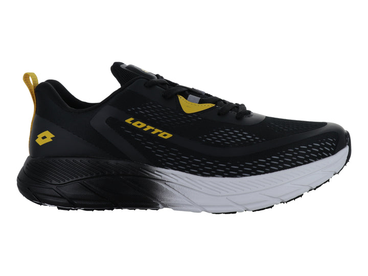 Tenis deportivos Lotto negros con detalles amarillos y suela blanca y negra.