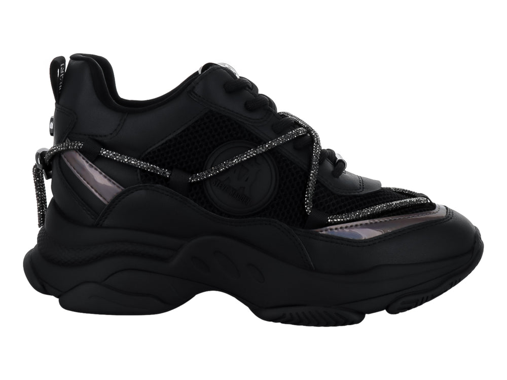 Tenis chunky Steve Madden color negro con detalles brillantes en color plata y suela gruesa.