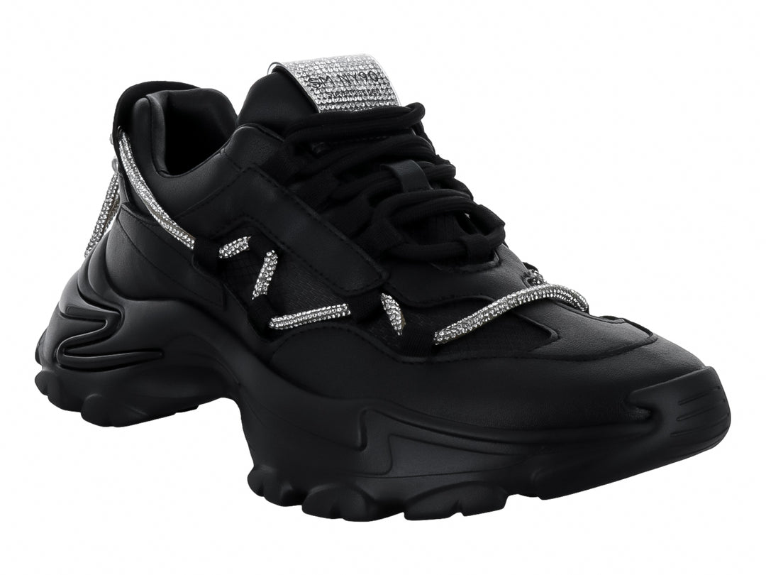 Tenis negros Steve Madden con detalles de cristales brillantes y suela chunky.