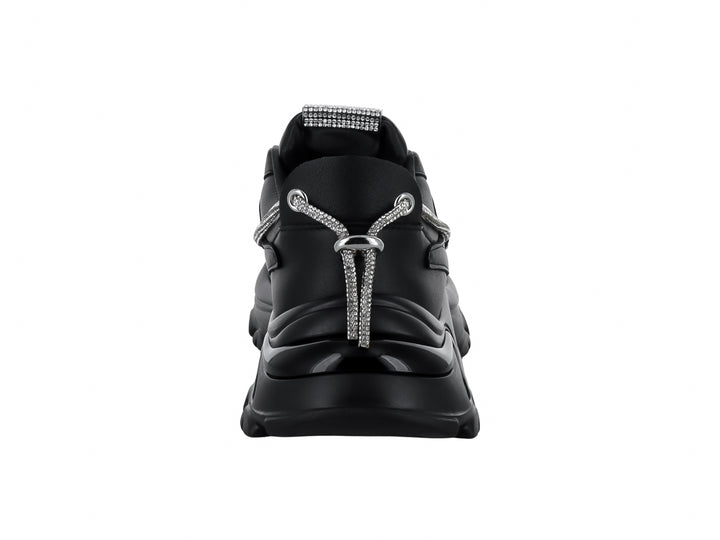 Tenis negros Steve Madden con detalles de cristales brillantes y suela chunky.