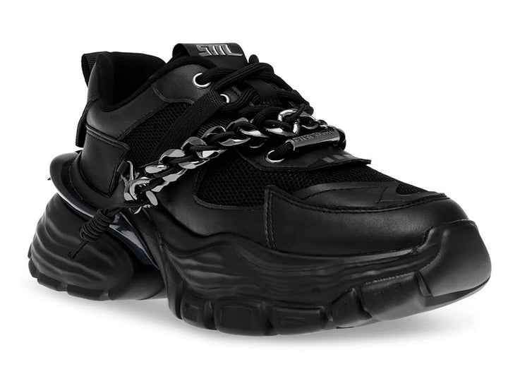Tenis negros de plataforma con detalle de cadena plateada y suela robusta.