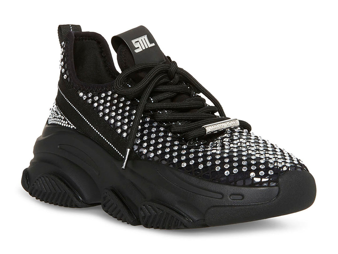 Tenis negros Steve Madden con incrustaciones brillantes y suela robusta.