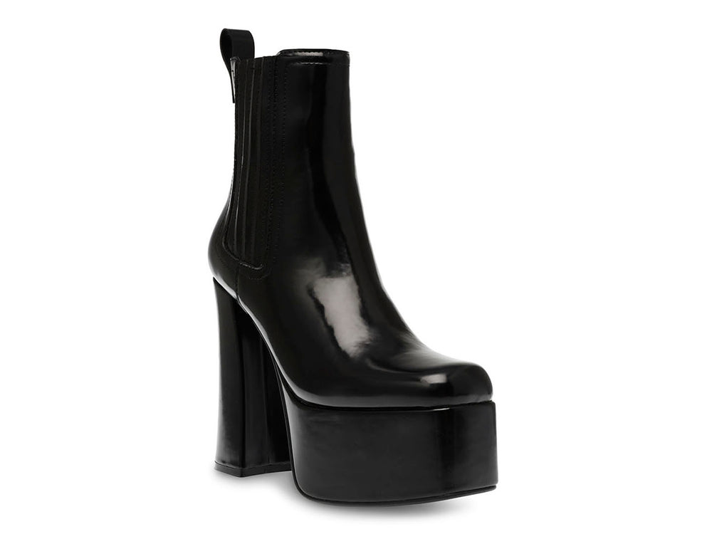 Botines negros de Steve Madden con plataforma alta y tacón grueso cuadrado.